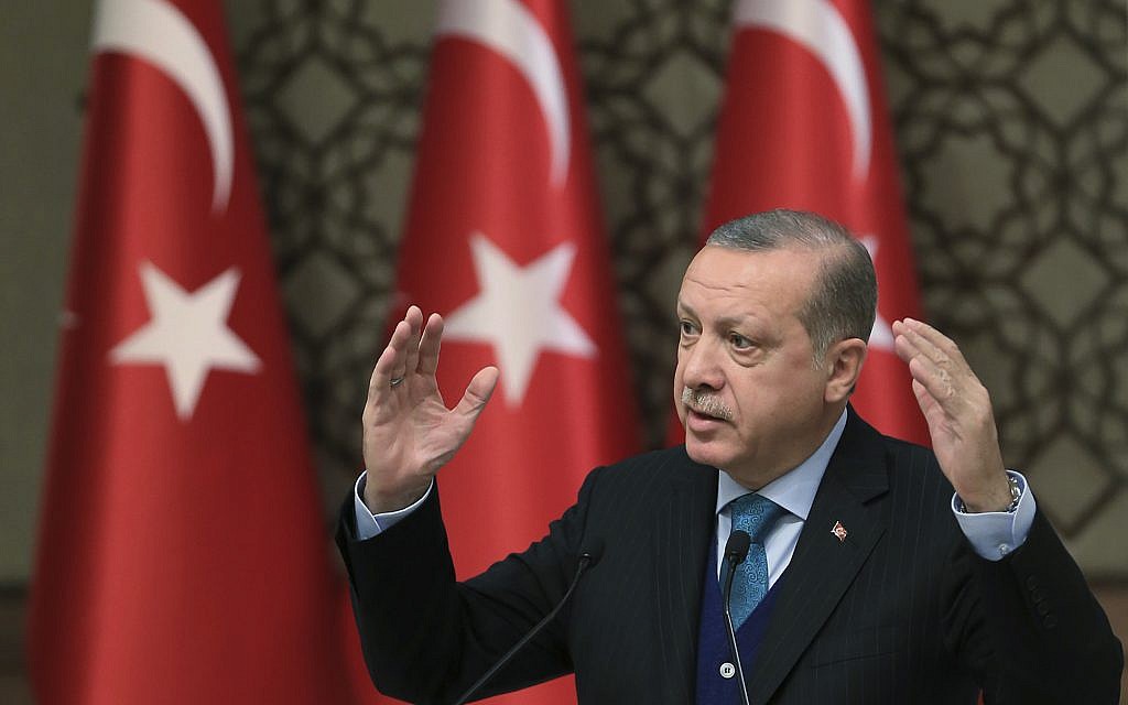Turkish President Recep Tayyip Erdogan gestures as he delivers a speech at an event in Ankara, Turkey, December 12, 2017. (AP)