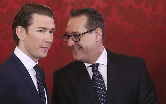 Newly sworn-in Austrian Chancellor Sebastian Kurz, left, and new Vice Chancellor Heinz-Christian Strache, the FPOe’s chairman, talk during the swearing-in ceremony of the new Austrian government in Vienna on December 18, 2017. (AP Photo/Ronald Zak)