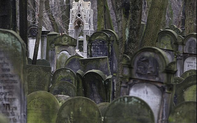 Illustrative: Gravestones at the Jewish cemetery on Okopowa Street in Warsaw, Poland, on December 22, 2017. (AP Photo/Czarek Sokolowski)