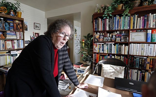 In this Monday, Nov. 6, 2017, photo, Helen Radkey, a researcher of the Mormon church's massive genealogical database, is at her home in Holladay, Utah. (AP Photo/Rick Bowmer)