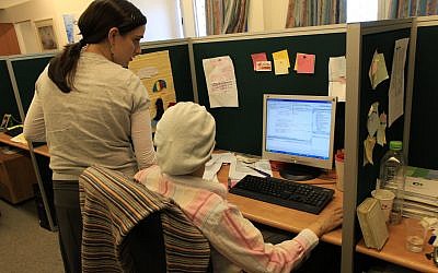 Illustrative: Ultra-Orthodox women working at the Malam Group IT company in the settlement of Beitar Illit, August 19, 2009. (Nati Shohat/Flash90/File)