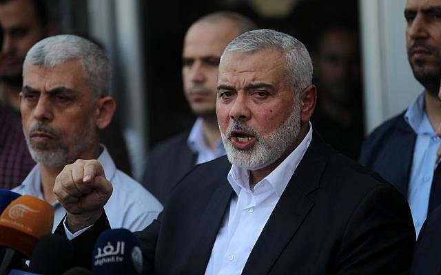 Hamas chief Ismail Haniyeh speaks to the press at the Rafah Border Crossing with Egypt in the southern Gaza Strip on September 19, 2017. (Abed Rahim Khatib/Flash90)
