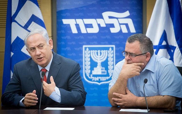 File: Prime Minister Benjamin Netanyahu, left, with MK David Bitan during a Likud party faction meeting at the Knesset, November 27, 2017. (Miriam Alster/Flash90)