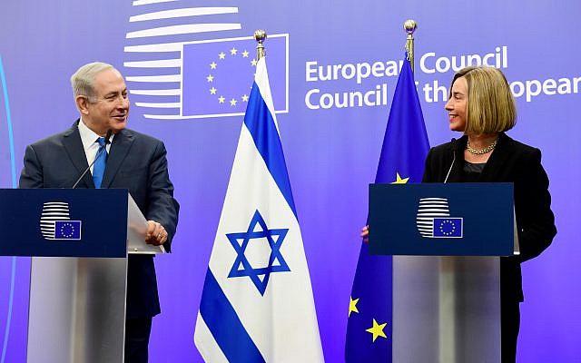 Prime Minister Benjamin Netanyahu (left)  holds a joint press conference with the European Union's foreign policy chief, Federica Mogherini in Brussels, Belgium, October 11, 2017.(Avi Ohayon/GPO)