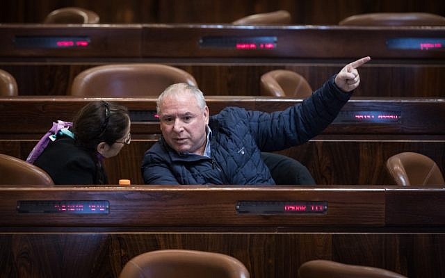 Coalition chairman David Amsalem seen during a marathon plenary session in the Knesset regarding the police recommendations bill. December 27, 2017 (Hadas Parush/Flash90)