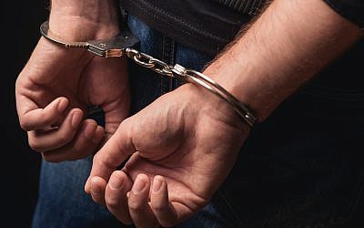 Illustrative. A criminal in handcuffs. (Yakobchuk Olena/ iStock, by Getty Images)