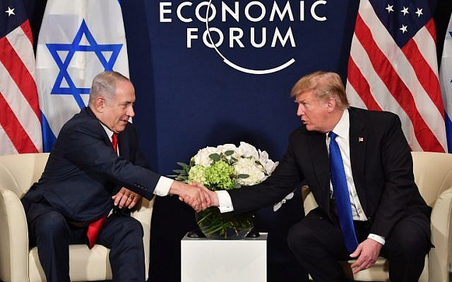 US President Donald Trump (right) and Prime Minister Benjamin Netanyahu, during a bilateral meeting on the sidelines of the World Economic Forum (WEF) annual meeting in Davos, Switzerland, on January 25, 2018. (AFP Photo/Nicholas Kamm)