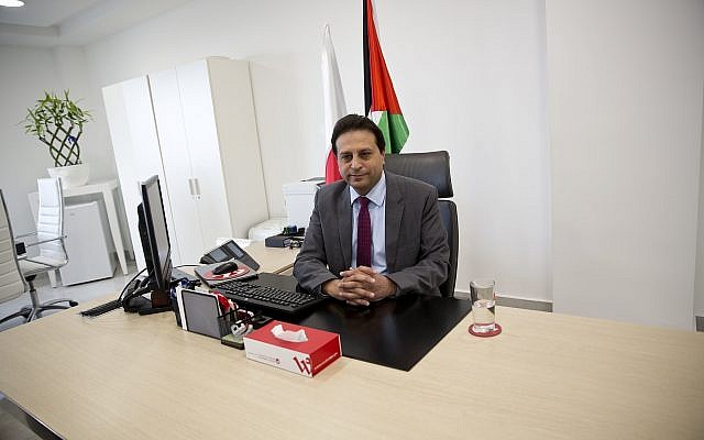 In this January 10, 2018, photo, Palestinian cellphone provider Wataniya CEO Durgham Maraee speaks with the Associated Press at his office in the West Bank city of Ramallah. (AP Photo/Majdi Mohammed)