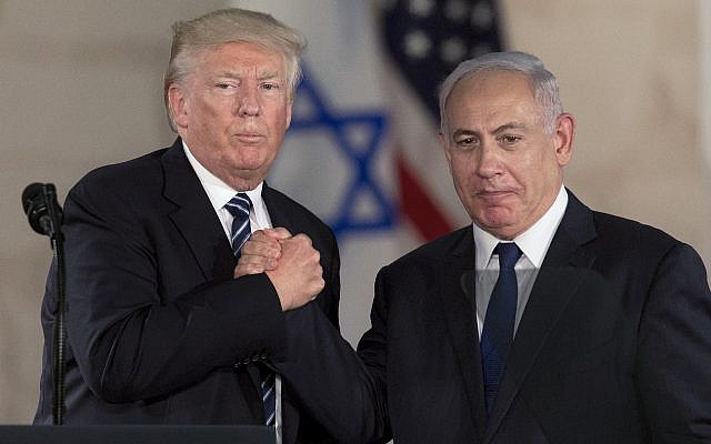 In this Tuesday, May 23, 2017 file photo, US President Donald Trump, left, shakes hands with Israeli Prime Minister Benjamin Netanyahu at the Israel Museum in Jerusalem (AP Photo/Sebastian Scheiner, File)