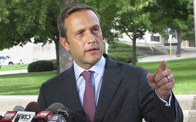 Paul Nehlen, a Republican challenger to House Speaker Paul Ryan, speaks in Janesville, Wis. Nehlen says he believes an unfounded right-wing online conspiracy theory dubbed "pizzagate" on Aug. 3, 2016. The conspiracy theory claims Democrats harbor child sex slaves at a pizza restaurant in Washington, D.C. (AP Photo/Scott Bauer, File)