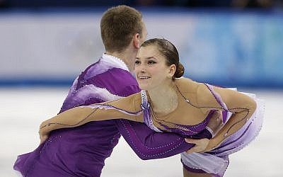 Andrea Davidovich and Evgeni Krasnopolski of Israel compete in the pairs short program figure skating competition at the Iceberg Skating Palace during the 2014 Winter Olympics, Tuesday, Feb. 11, 2014, in Sochi, Russia. (AP Photo/Darron Cummings)