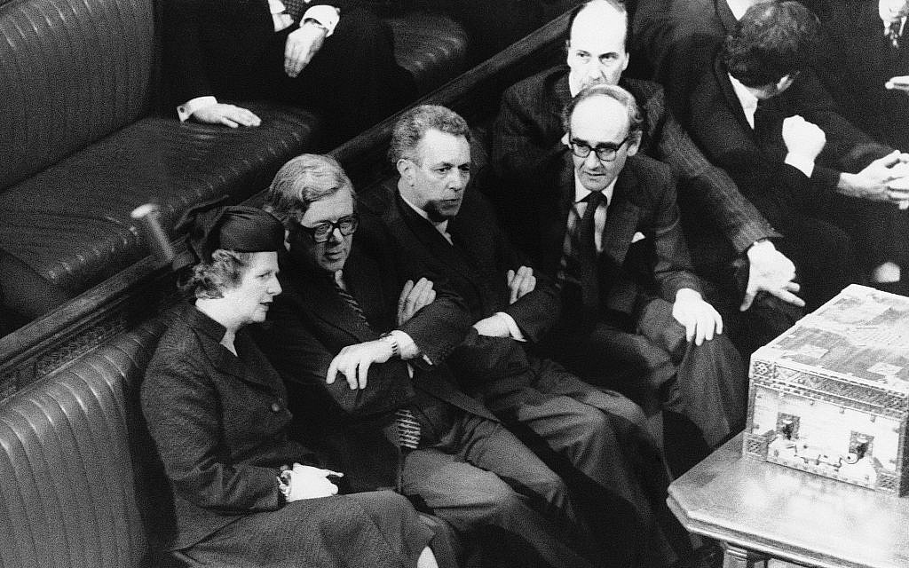 The Conservative government front bench sit in the House of Commons in London, April 11, 1981. Left to right are then-Prime Minister Margaret Thatcher, Chancellor of the Exchequer Sir Geoffrey Howe, Education Secretary Sir Keith Joseph, Defense Secretary John Nott, and Employment Secretary Norman Tebbit. (AP Photo/BIPHA/Central Press Photos)