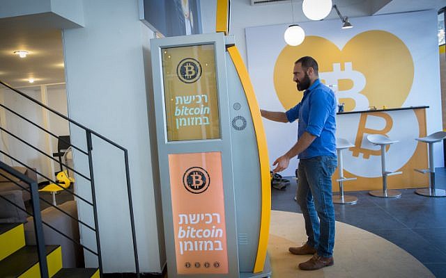 View of the Bitcoin Change center on Dizengoff Street in Tel Aviv, showcasing a museum describing the history of the cryptocurrency as well as hosting a Bitcoin ATM and a meeting place for cryptocurrency community meetups. November 05, 2017.  (Miriam Alster/FLASH90)
