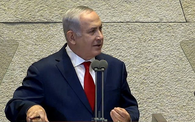 Prime Minister Benjamin Netanyahu addresses the Knesset plenum during a special session with visiting US Vice President Mike Pence, January 22, 2018 (screen capture: YouTube)