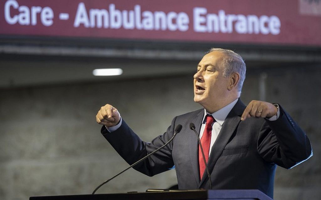 Prime Minister Benjamin Netanyahu speaks at the inauguration of the new emergency room at Barzilai Hospital in Ashkelon on February 20, 2018. (AFP Photo/Jack Guez)