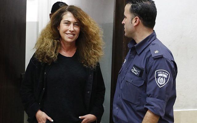 Stella Handler (L), CEO of the Bezeq telecom company, appears in the Tel Aviv District Court on February 21, 2018. (AFP PHOTO / JACK GUEZ)