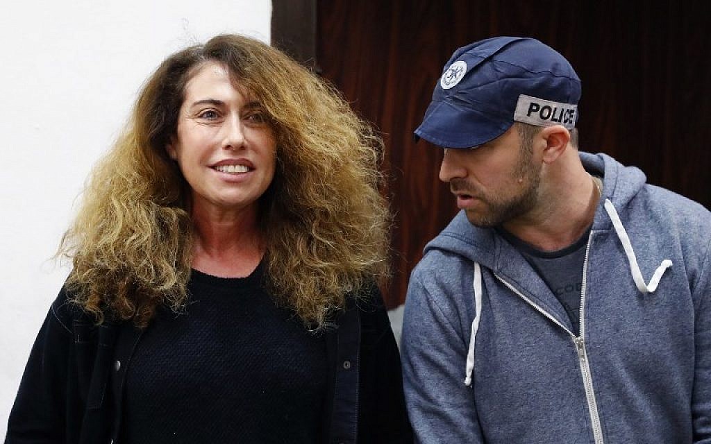 Stella Handler (L), CEO of the Bezeq telecom company, appears in the Tel Aviv District Court on February 21, 2018. (AFP Photo/Jack Guez)