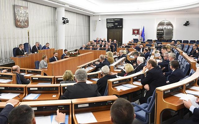Senators attend an overnight session at the Polish Senate in Warsaw, on February 1, 2018. (PAP/Radek Pietruszka/AFP)