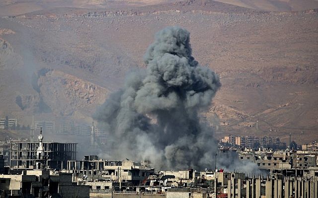 Syria strikes said to kill 23 civilians in rebel area near Damascus ...