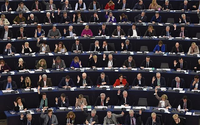 Members of the European Parliament take part in a voting session on February 6, 2018, in Strasbourg, eastern France. (AFP Photo/Frederick Florin)