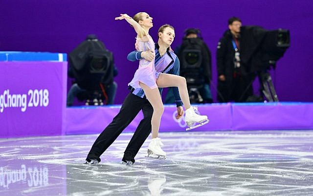 Israel’s Paige Conners and Evgeni Krasnopolski compete in the figure skating team event pair skating short program during the Pyeongchang 2018 Winter Olympic Games at the Gangneung Ice Arena in Gangneung on February 9, 2018. (AFP/ Mladen ANTONOV)