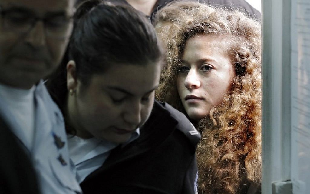 17-year-old Palestinian Ahed Tamimi (R), arrives for the beginning of her trial at the Ofer Military Court in the West Ban on February 13, 2018. (Thomas Coex/AFP)