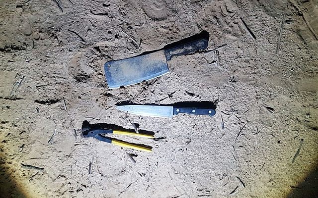 Two knives and a pair of pliers that were in the possession of a Palestinian man who was one of four suspects who crossed into Israel from the Gaza Strip on February 1, 2018. (Israel Defense Forces)