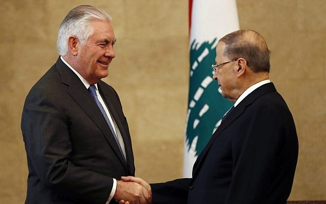 Lebanese President Michel Aoun, right, shakes hands with US Secretary of State Rex Tillerson at the presidential palace in Baabda, east of Beirut, Lebanon, on February 15, 2018.  (AP Photo/Hussein Malla)