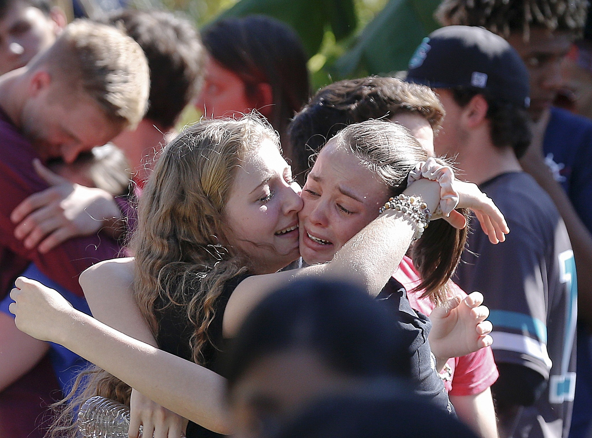 Tears and guilt grip survivors at US school shooting vigils | The Times ...