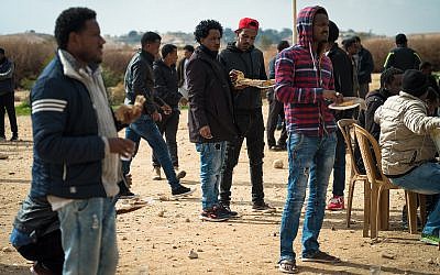 Eritrean asylum seekers outside the Holot detention facility in southern Israel, January 29, 2018. (Luke Tress/Times of Israel)