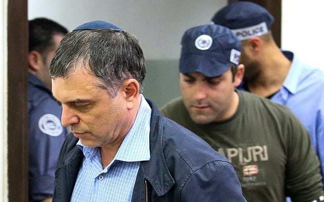 Shlomo Filber, director-general of the Communications Ministry, arrives for extension of his remand in Case 4000 at the Magistrate's Court in Rishon Letzion, February 18, 2018. (Flash90)