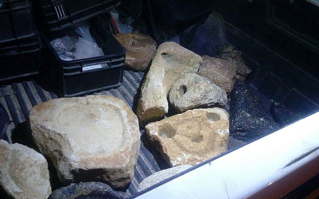 Ancient millstones found in a private home in the village of Um Reihan in the northern West Bank, February 13, 2018. (Israel Police)