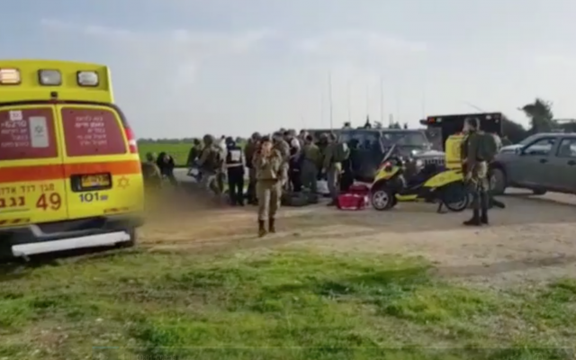 Israeli troops and first responders at the Gaza border following an explosion that targeted an IDF patrol, February 17, 2018 (Hadashot news screenshot)