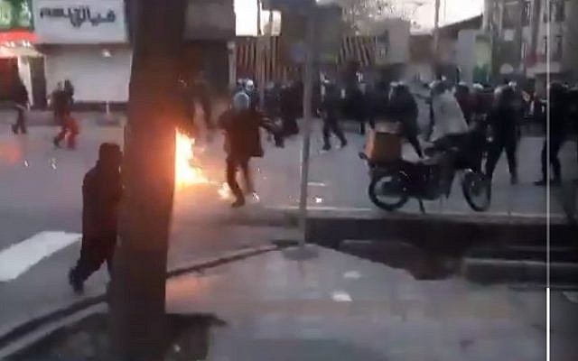 A screenshot of a video from Twitter reporting to show clashes between Sufi protesters and police in Tehran on February 19, 2018. (Screen capture: Twitter)