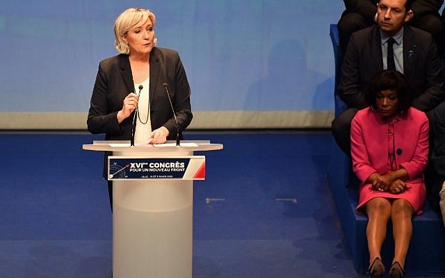 French far-right party Front National president Marine Le Pen speaks during her party's congress on March 11, 2018 in Lille, north of France, after being re-elected for a third term as leader. (AFP/PHILIPPE HUGUEN)