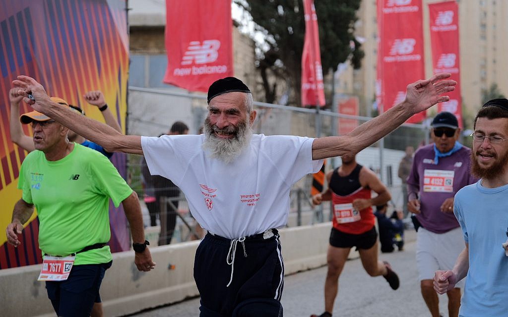 Runners take part in the international Jerusalem Marathon on March 9, 2018. (Flash90 via Jerusalem municipality)