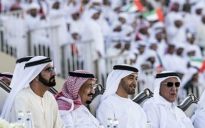 In this December 4, 2016 file photo, released by Emirates News Agency, WAM, Saudi King Salman, second left, attends the Sheikh Zayed Heritage Festival while seated next to Sheikh Mohammed bin Rashid Al Maktoum, UAE prime minister and ruler, left, and Sheikh Mohamed bin Zayed Al Nahyan, Crown Prince of Abu Dhabi, second right, in Abu Dhabi, United Arab Emirates. (Emirates News Agency via AP)