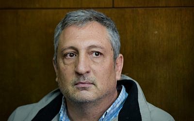 Former media adviser to the prime minister Nir Hefetz arrives for a remand hearing in Case 4000 at the Tel Aviv District Court, February 22, 2018 (Flash90)