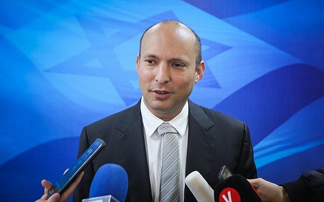 Education Minister Naftali Bennett speaks with the press ahead of the weekly cabinet meeting at the Prime Minister's Office in Jerusalem, on March 11, 2018. (Marc Israel Sellem/Pool)