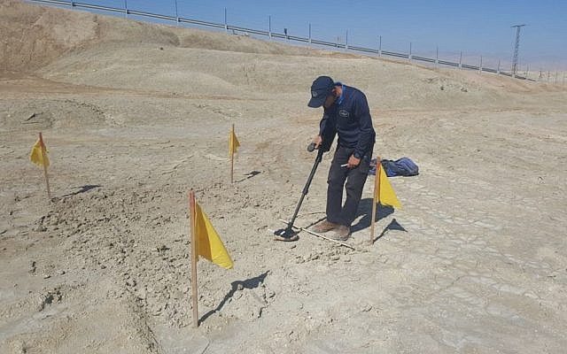 A sapper working to clear mines from the area around the  Qasr al-Yahud Baptism site on the Jordan River, March 2018. (Defense Ministry)
