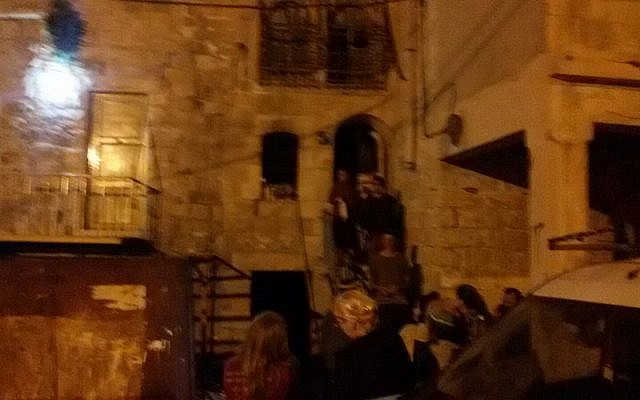 Settlers enter the disputed Rachel and Leah homes in Hebron on March 26, 2018. (Courtesy: Harhivi organization)