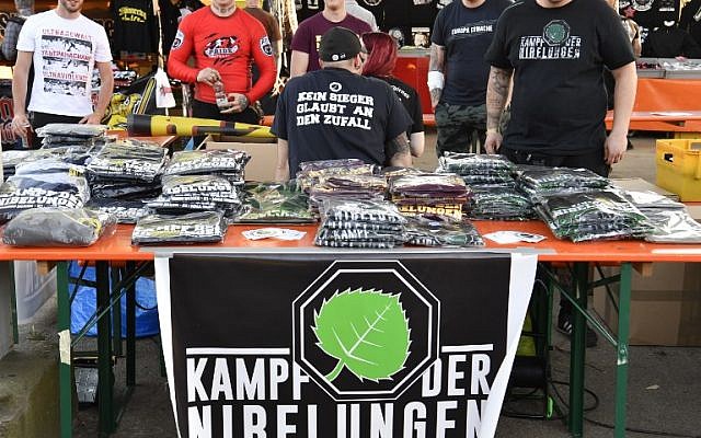Far-right paraphernalia is on sale at the Schild und Schwert (Shield and Sword) neo-nazi festival, in the small eastern German town of Ostritz on April 20, 2018. (AFP PHOTO / John MACDOUGALL)