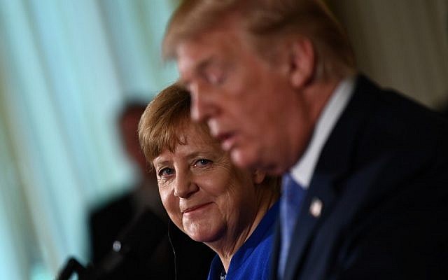 Germany's Chancellor Angela Merkel listens during a joint press conference with US President Donald Trump in the East Room of the White House on April 27, 2018 in Washington, DC. (AFP/Brendan Smialowski)