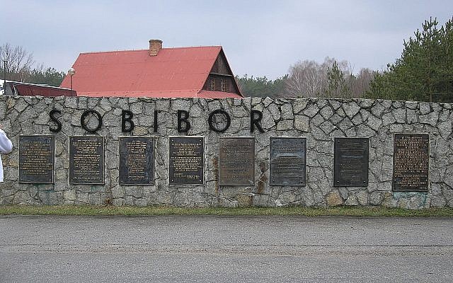Signs in eight languages at the site of the Sobibor death camp in Poland. (Flickr/Sgvb)