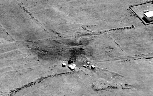 This image provided by the Department of Defense was presented as part of a briefing slide at the Pentagon briefing on Saturday, April 14, 2018, and shows a photo of a preliminary damage assessment from the Him Shinshar Chemical Weapons Bunker in Syria that was struck by missiles from the U.S.-led coalition in response to Syria's use of chemical weapons on April 7. (Department of Defense via AP)