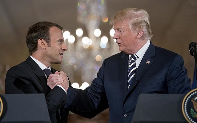 US President Donald Trump and French President Emmanuel Macron shake hands during a joint news conference in the East Room of the White House in Washington, Tuesday, April 24, 2018. (AP Photo/Andrew Harnik)