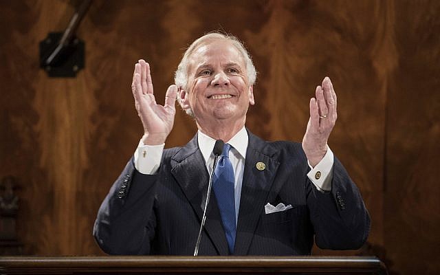 South Carolina Gov. Henry McMaster applauds a guest while delivering his state of the state address at the South Carolina Statehouse Wednesday, Jan. 24, 2018, in Columbia, S.C. (AP Photo/Sean Rayford)