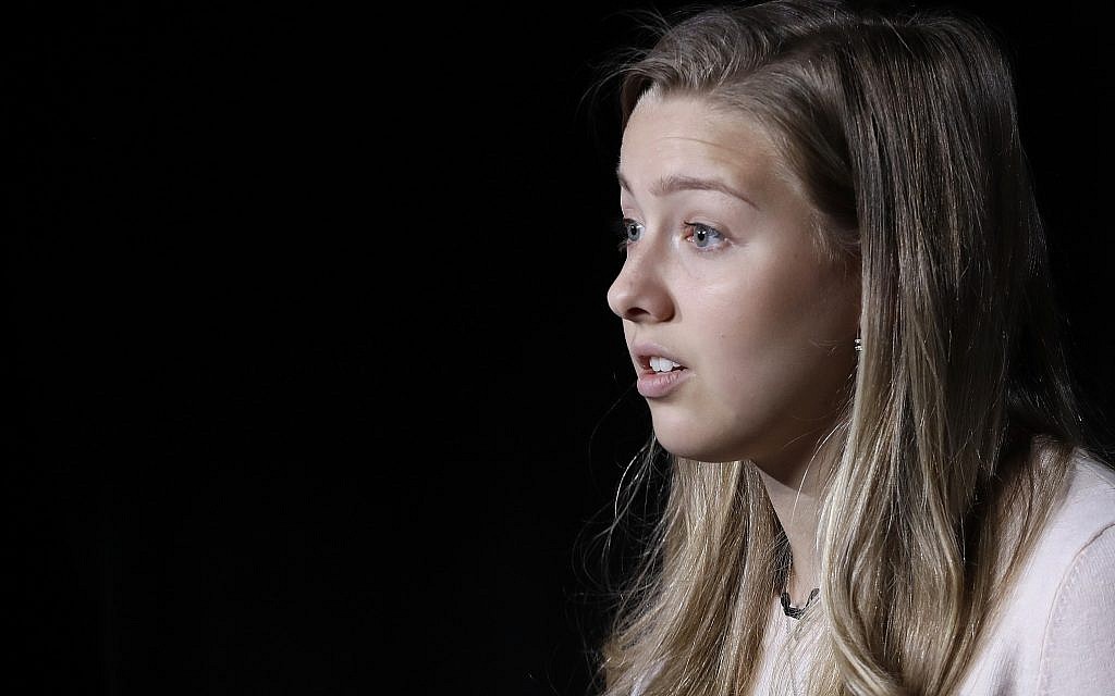 Chessy Prout, the author of 'I Have the Right To: A High School Survivor's Story of Sexual Assault, Justice and Hope,' talks during an interview, March 6, 2018, in New York. (AP Photo/Mark Lennihan)