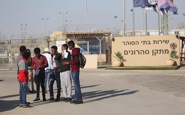 Illustrative: African asylum seekers leaving the Saharonim prison in southern Israel where they had been imprisoned due to their refusal to leave the country, April 15, 2018. (Hadas Parush/Flash90)