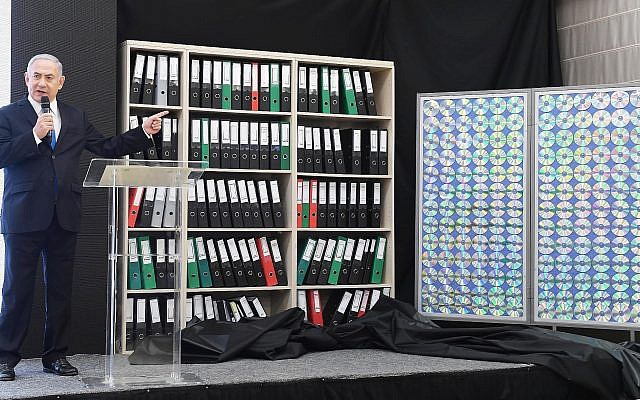 Prime Minister Benjamin Netanyahu showcases material he says was obtained by Israeli intelligence from Iran's nuclear weapons archive, in Tel Aviv on April 30, 2018. (Amos Ben-Gershom (GPO)